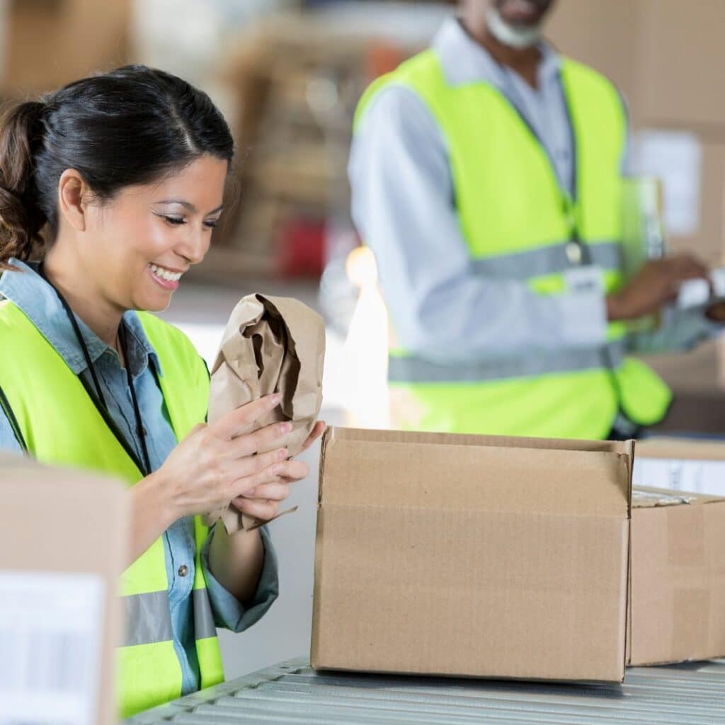 An example of 2 people doing pick and pack services in a warehouse.