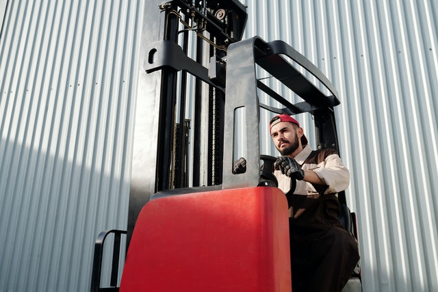 3PL warehouse worker on a forklift