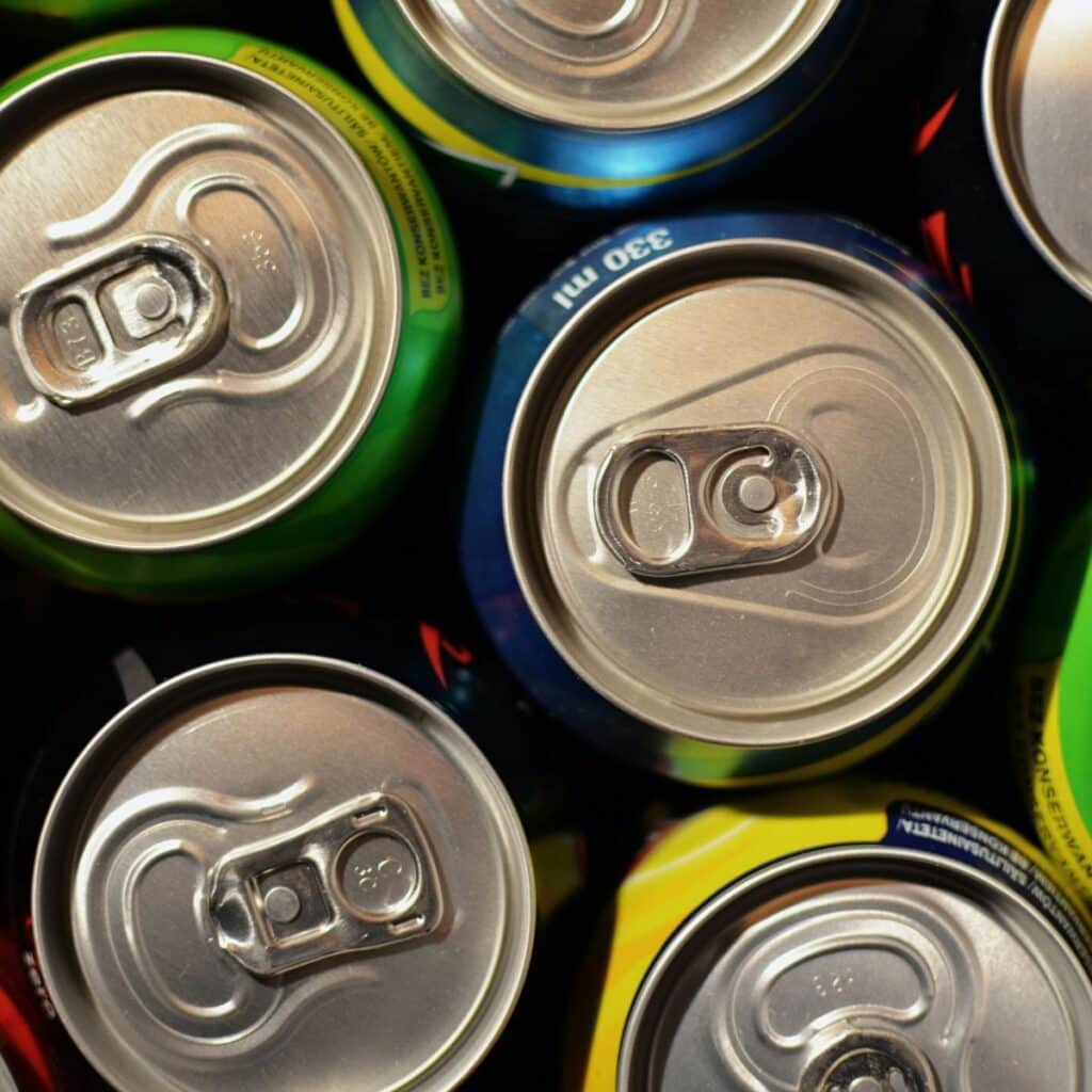 Beverages - A picture of the tops of soda cans.